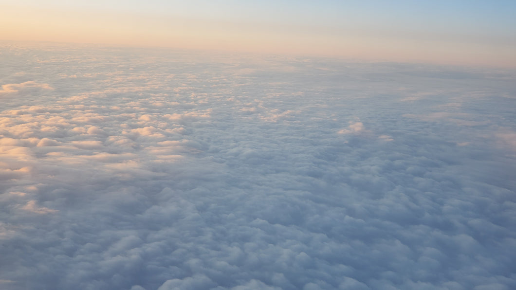 The Top of Clouds Near Sunset